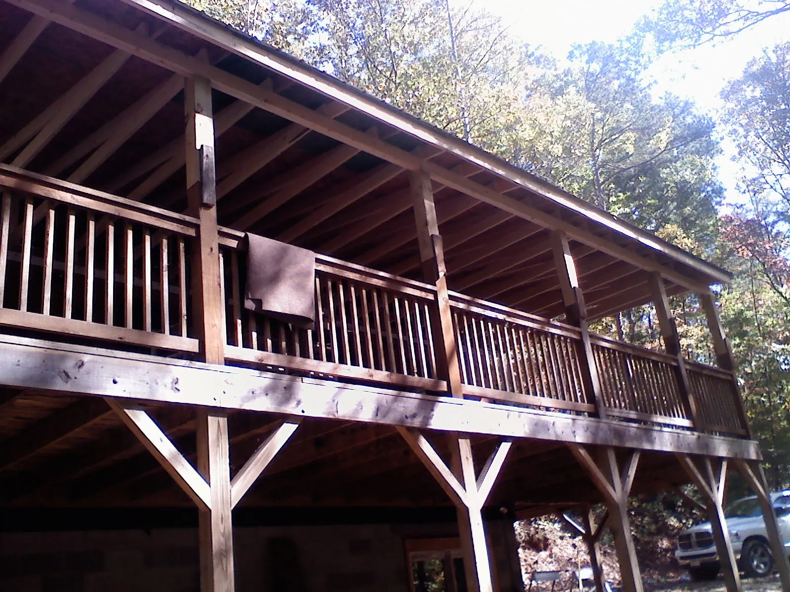 Timber framing under a new elevated porch and deck — Roof Leak Repair in Viola by Roofing Brothers